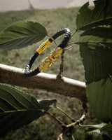 TWIN SKULLS / BLACK LEATHER & GOLD